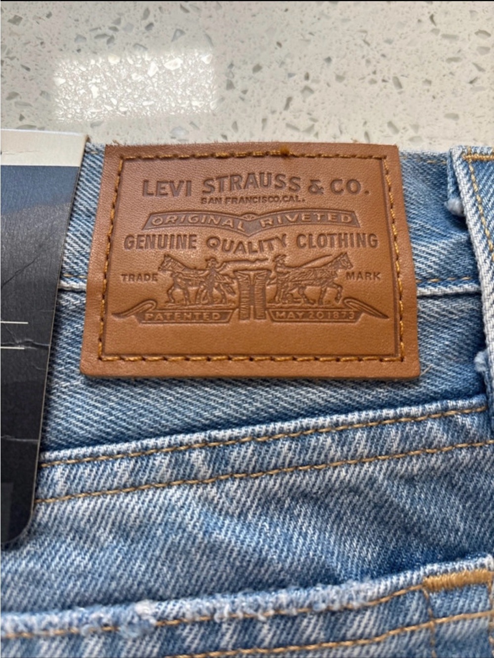 Levi's Men's Light Blue Denim Jeans with Brown Leather Patch